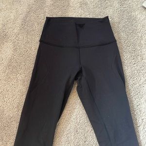 RARE!! Lululemon black leggings with Lululemon leg!